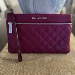 Michael Kors large leather wristlet
10.5x6.5”